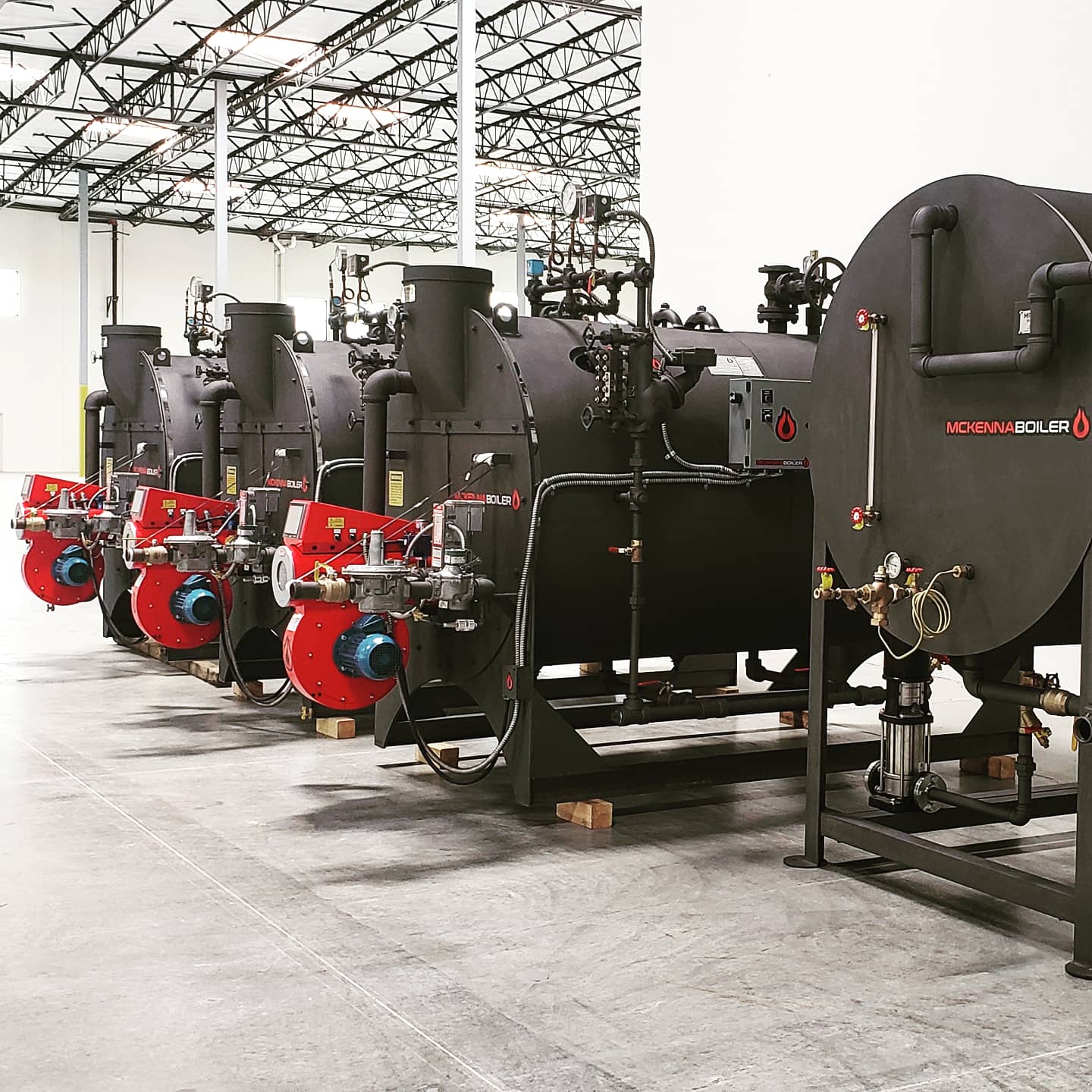 Row of McKenna-built boilers on the shop floor